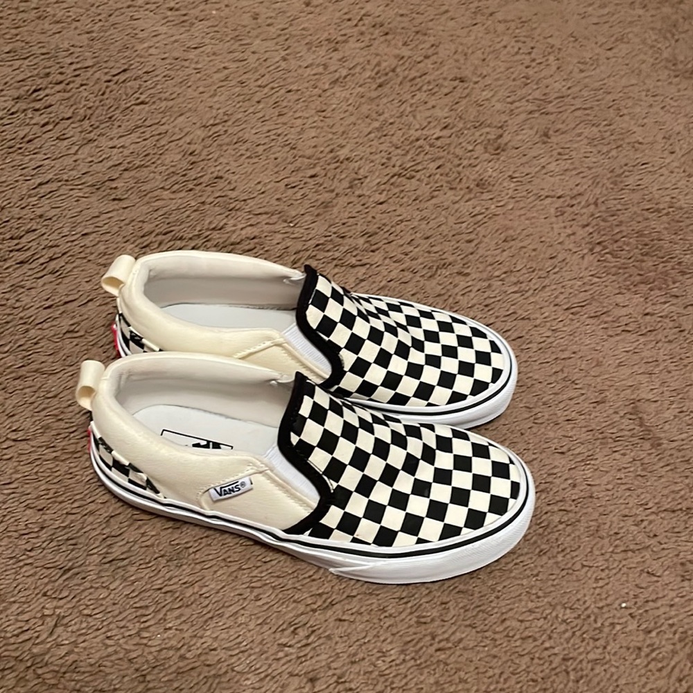 White and black checkered vans